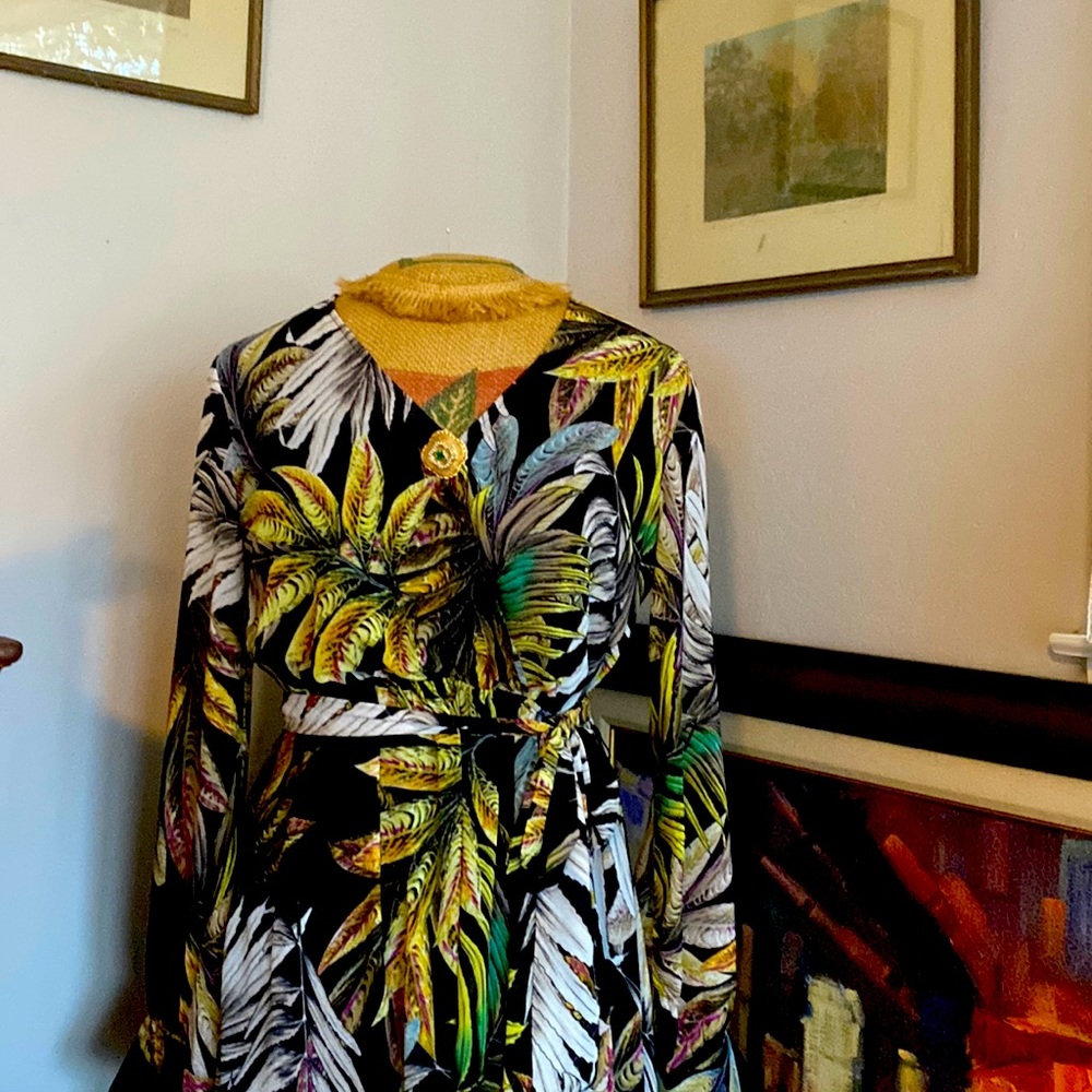 Comfortable flowing fun dress. Easy to wear long sleeves w/button embellishment
